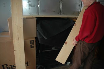 The grill positioned between items in the trailer during loading